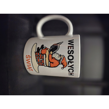 Kubek świąteczny - Mikołaj na kominie